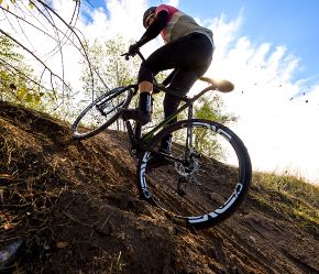 cx & gravel biking on custom handbuilt carbon disc for ultralight