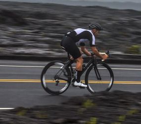 road biking on custom handbuilt carbon disc for aero