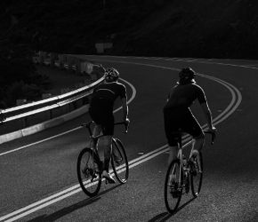road biking on custom handbuilt carbon for climb
